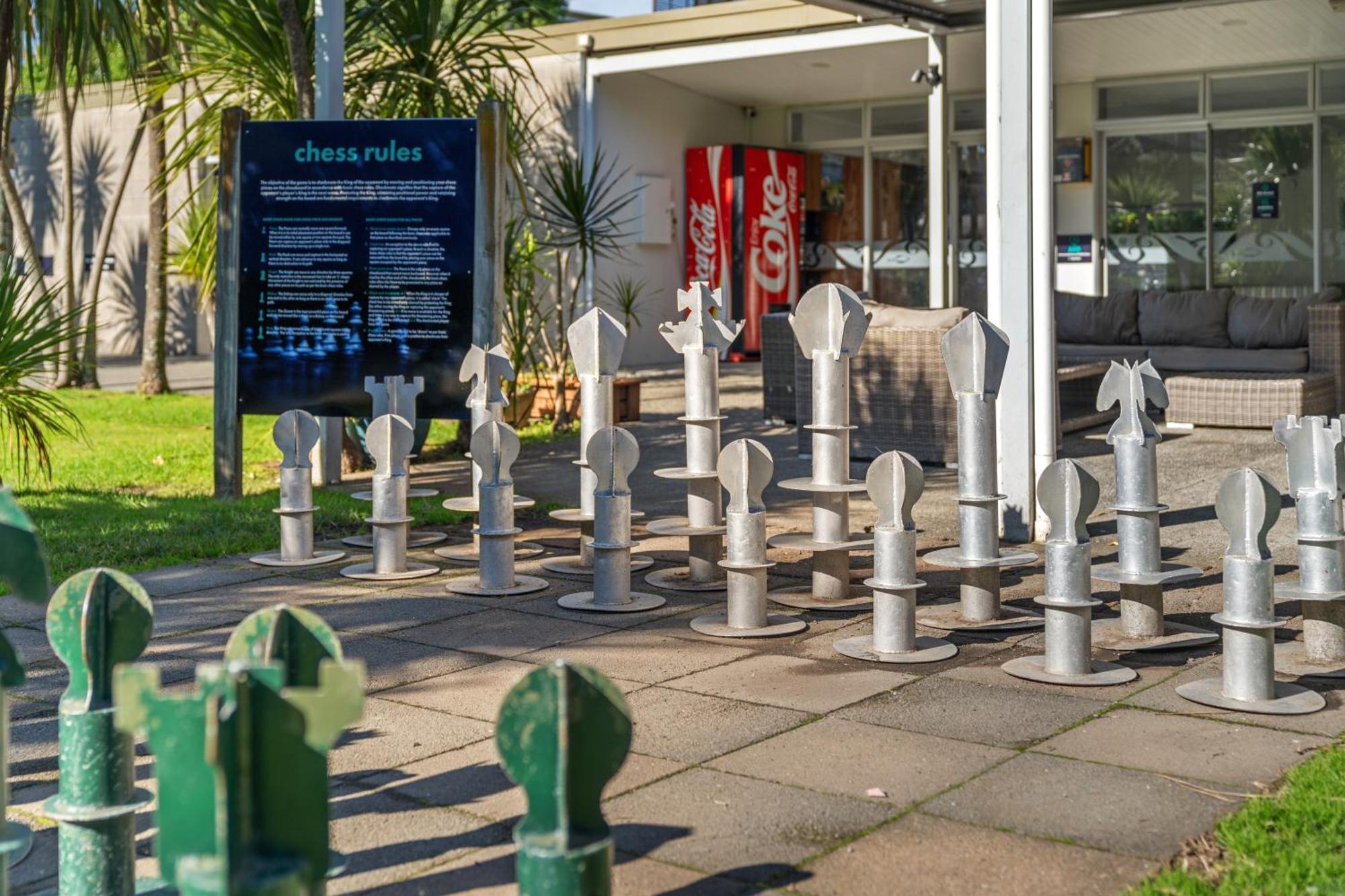 Tasman Holiday Parks - Waihi Beach Εξωτερικό φωτογραφία Chess set at the entrance of the library